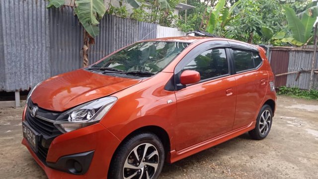 Promo Mobil Xenia Akhir Tahun 2017. Promo akhir tahun Daihatsu Ayla 2017 warna Orange bekas, baru dengan diskon fantastis, harga dijamin termurah